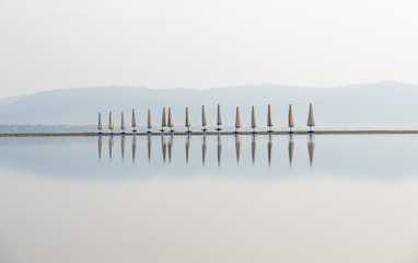 After the rain at the beach - Long Exposure of beach umbrellas at Poetto, Cagliari, Sardinia