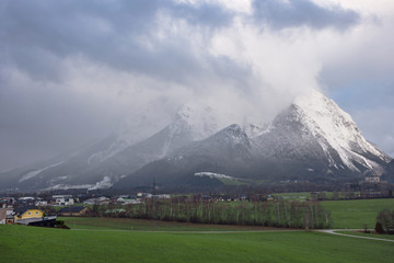 Winter landscape with snow covered Grimming mountain in Ennstal, Steiermark, Austria
