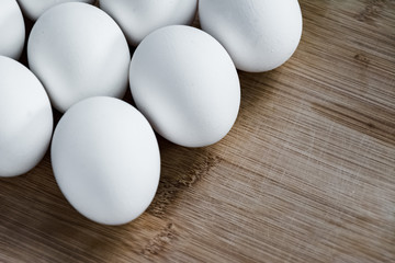 chicken egg on a dark background. food supply. concept of ingredients for cooking eggs
