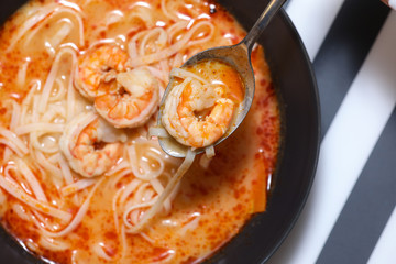 Asian spicy soup Tom Yum with shrimps