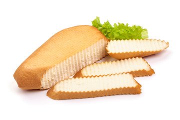 Traditional rustic smoked cheddar cheese, isolated on white background