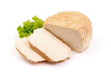 Traditional goat cheese, isolated on white background