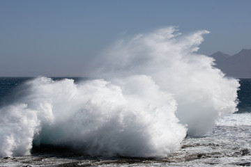 Big waves crashing on the rocks