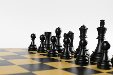 Black chess figures on the chessboard