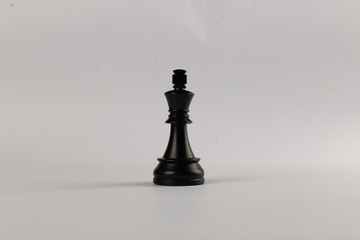 Black king figure isolated on white background