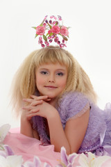 young princess wearing a crown of flowers