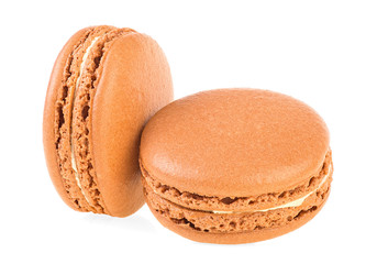 Delicious brown macaroons isolated on a white background