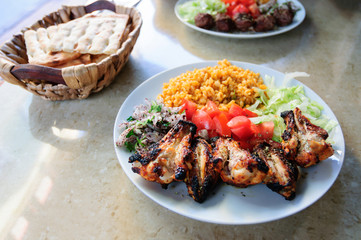Grilled chicken wings in a street cafe in Istanbul.