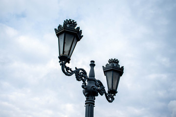 street lamp in front of blue sky