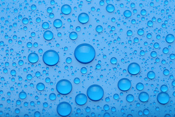 Water drops on blue background