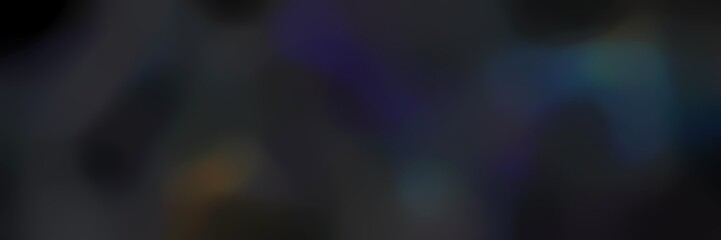 Obraz premium blurred bokeh landscape format background texture with very dark blue, very dark violet and black colors and free text space