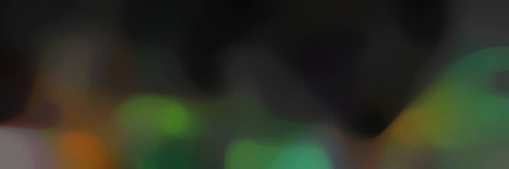 blurred iridescent landscape format background with very dark green, dark olive green and brown colors and space for text or image
