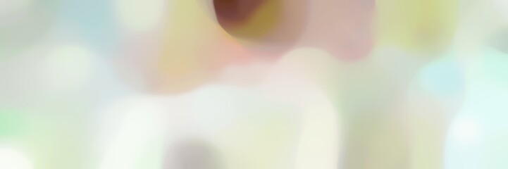 blurred bokeh iridescent landscape format background texture with light gray, pastel brown and pastel gray colors space for text or image