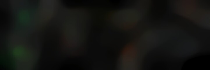 unfocused smooth landscape format background with black and very dark green colors and space for text or image