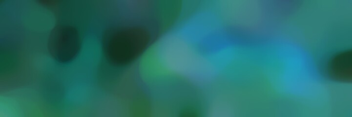 blurred landscape format background with dark slate gray, steel blue and teal blue colors and space for text