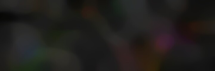 blurred landscape format background texture with very dark green, very dark blue and very dark pink colors and space for text