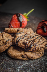 Tasty chocolate cookie dessert with fresh strawberries