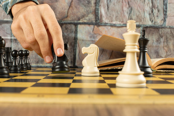 Chess figures position and a player