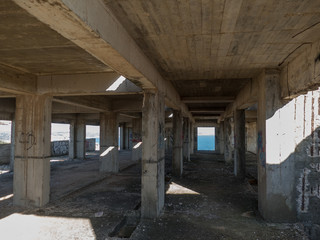 ruin of an unfinished concrete skeleton building