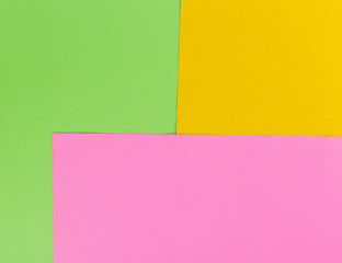 Green, pink and orange color papers background