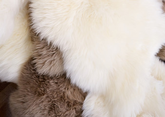 Faux animal skins white and brown, close-up