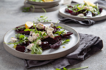 Beetroot cheese salad carpaccio with arugula and lemon
