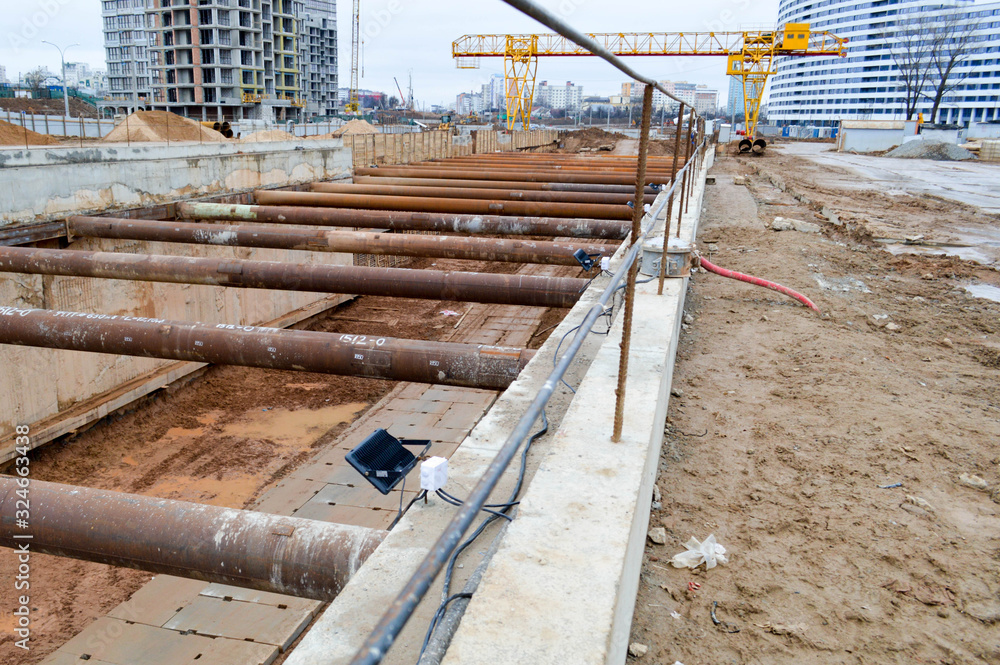 Aufkleber a large huge ditch pit tunnel with reinforcing structures from thick iron pipes of beams and structu