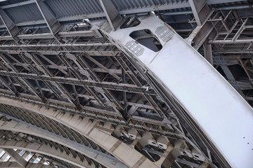Part of the metal construction of the car bridge across the river from the inside.