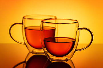 Glass cups with tea.
