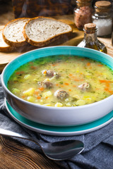 Polish barley soup with vegetables and chicken heart.