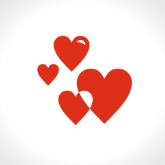 Red hearts. Flat vector template of four hearts of different sizes of the same shape. Two hearts intersect.