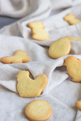 Easter cookies on a grey linen napkin. Homemade butter and sugar cookies.