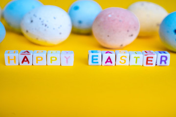 Easter greeting card with painted eggs. Seasonal Easter message  