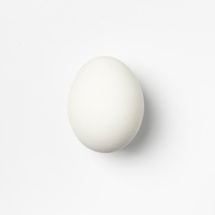 minimalistic white egg isolated on white background