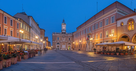 Fototapeta na wymiar Ravena - The square Piazza del Popolo at dusk.