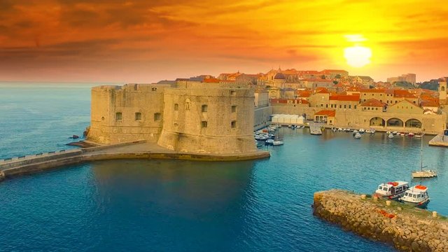 Duborvnik skyline aerial view at sunset view of old town and sea coast, dubrovnik croatia city.