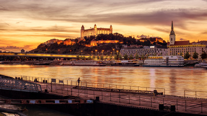 Bratislava city on Danube river, Slovakia, on sunset