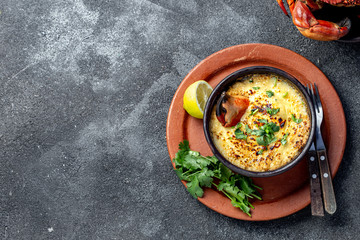  CHILEAN FOOD.  Baked crabmeat crab meat with cheese, cream and bread.  Traditional dish of chilean...