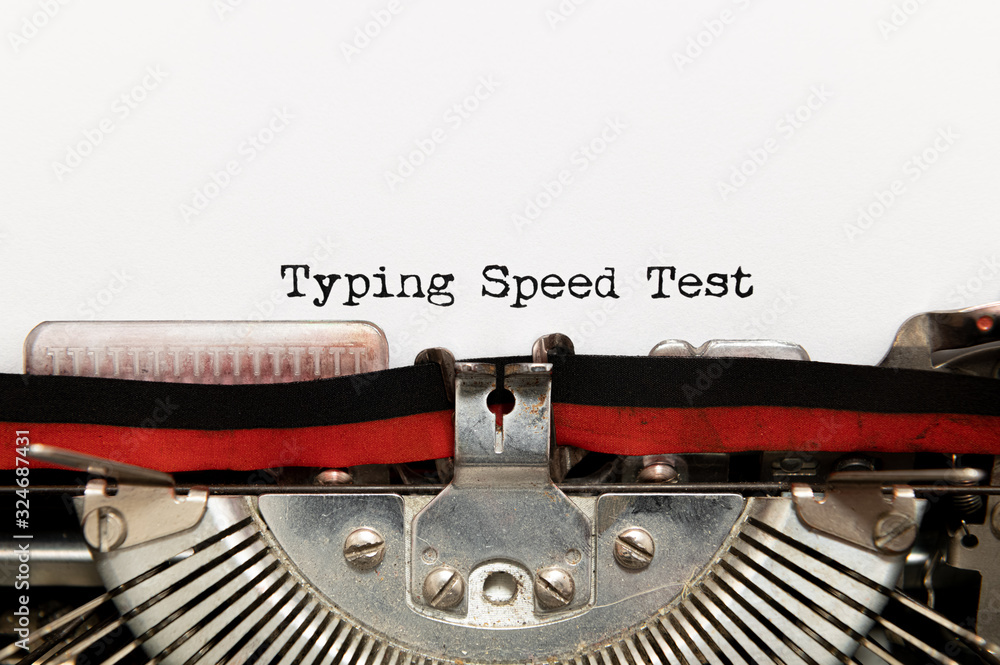 Poster typing speed test title text printed on paper with typewriter