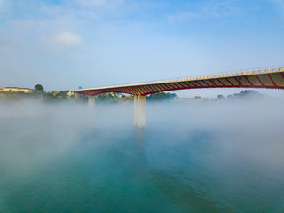 Aerial view on dos Santos bridge during fog and bay. Near Ribadeo in Northern Spain