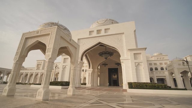 A view of the exterior facade of Qasr Al Watan Palace of the Nation which is made of white granite and limestone