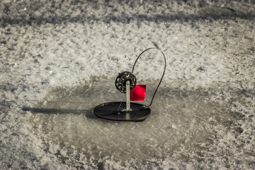 winter fishing for pike on the imitation fish on live bait.