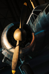 view of old airplane propeller in a military hangar