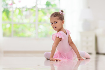 Baby ballet. Little ballerina girl in dance class.