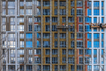 Fototapeta na wymiar Construction of modern high-rise buildings. New residential complexes. The concept of urban development.