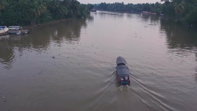 Boat tour on Kerala backwaters at Alleppey, India. Aerial drone view