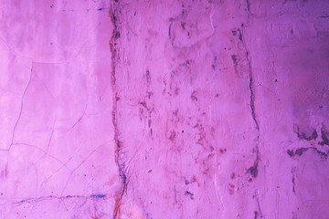 Vintage purple concrete walls background. Rough wall texture.