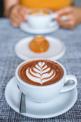 hot chocolate with beautiful art on top