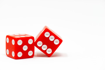 Pair of red dice isolated on white background