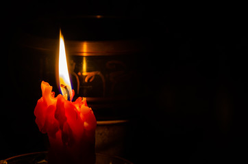 Tibetan singing bowl with rosary and mantra Om Mani Padme hum on the background of the flag of...